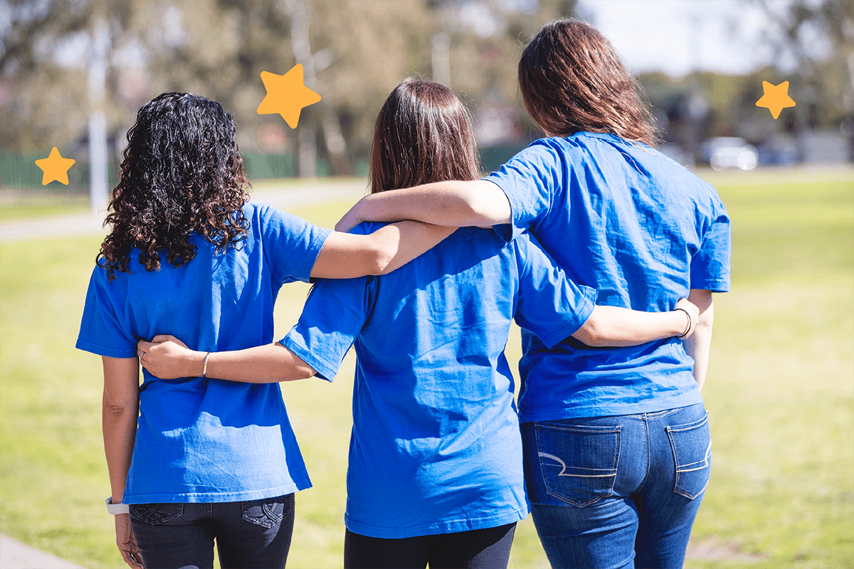 3 Make-A-Wish people in blue shirts