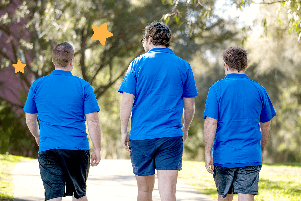 3 Make-A-Wish people in blue shirts
